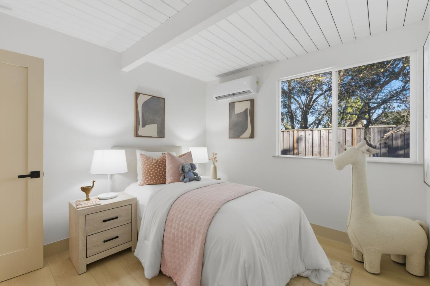 2212 Juniperberry Drive San Rafael, CA 94903 - Photo 32 of 81 a bedroom with a bed and a painting on the wall