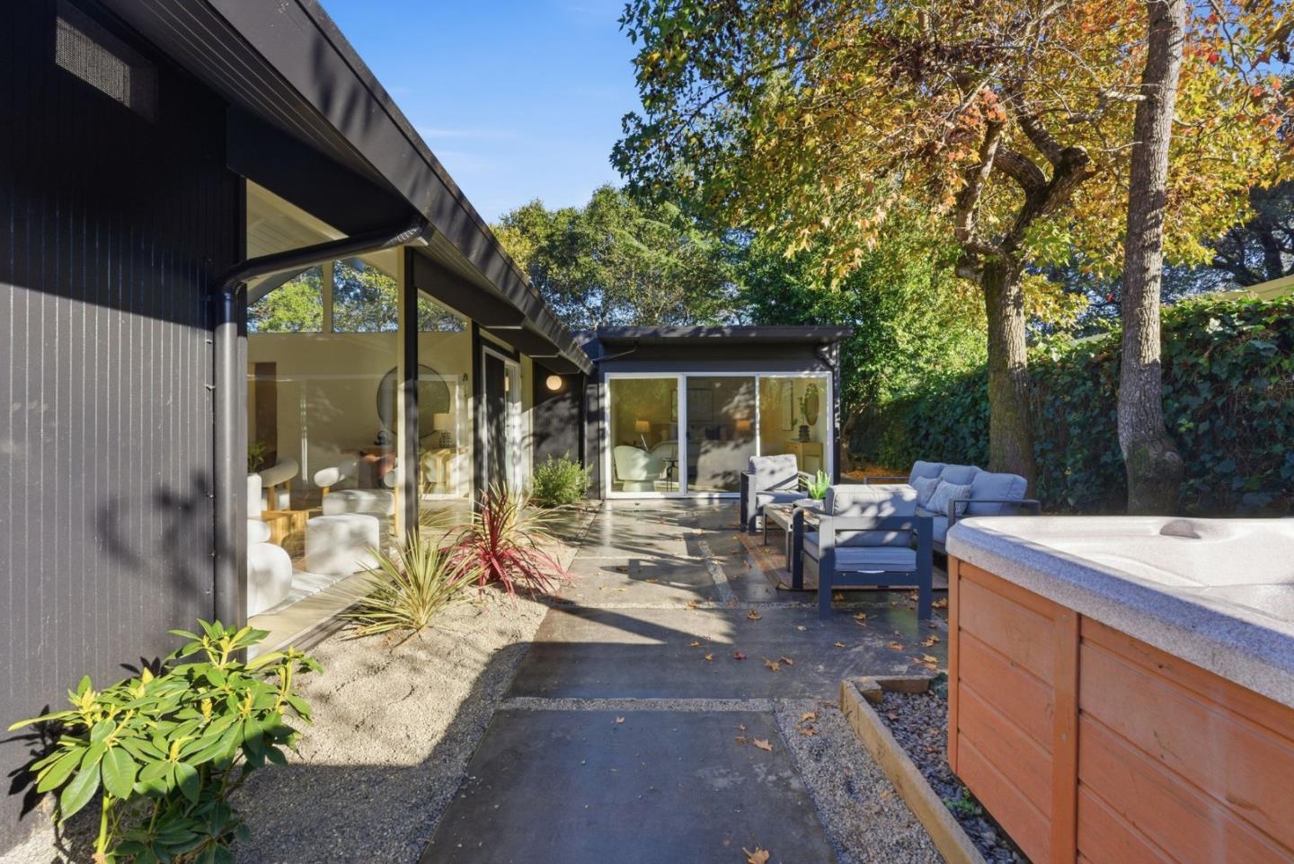 2212 Juniperberry Drive San Rafael, CA 94903 - Photo 42 of 81 a view of a patio with couches table and chairs and potted plants