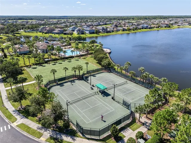 an aerial view of a house with a outdoor space