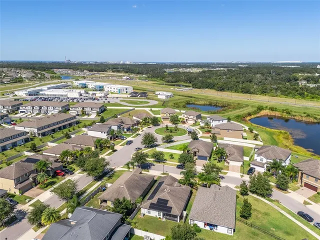 an aerial view of residential building with outdoor space