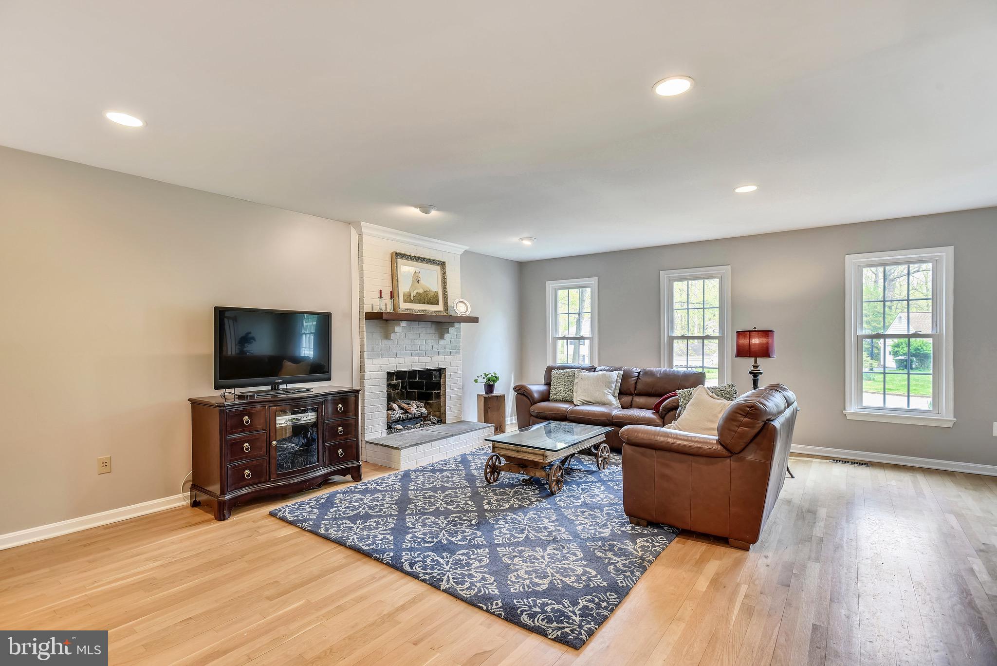11727 Quay Road Oakton, VA 22124 - Photo 13 of 47 Warm, welcoming family room with gas fireplace
