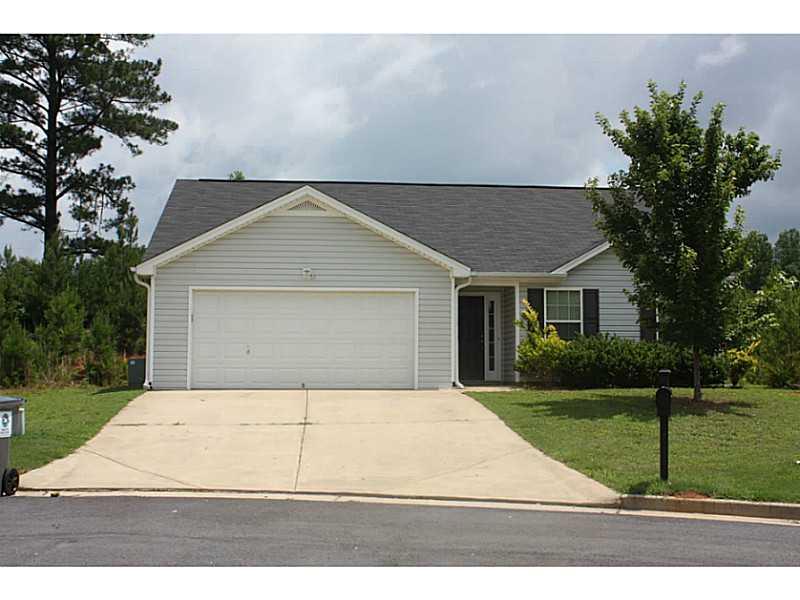 120 Rockefeller Lane Dallas, GA 30157 - Photo 1 of 1 Exterior Front. Level driveway and front yard