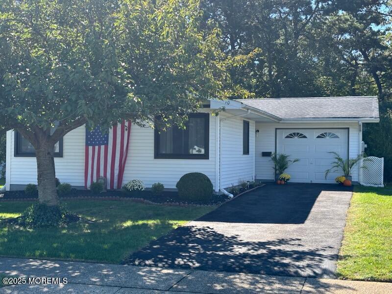 10 Whitman Street Brick, NJ 08724 - Photo 18 of 19 a front view of a house with garden