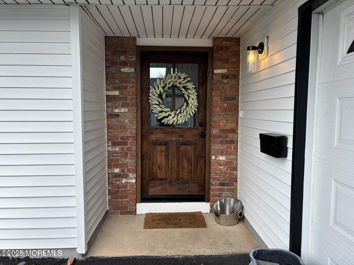 10 Whitman Street Brick, NJ 08724 - Photo 2 of 19 a view of entrance door of the house