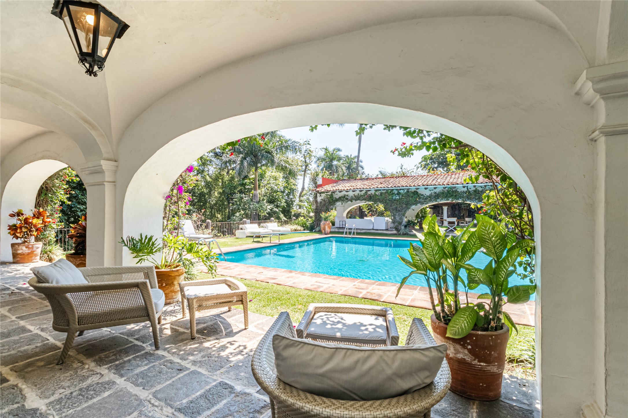 12 Jaime Nuno Granite City, undefined 62040 - Photo 24 of 25 a view of a swimming pool with a chairs and a potted plant