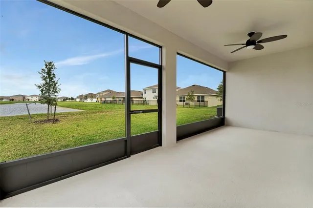 a view of a floor to ceiling window and an outdoor view