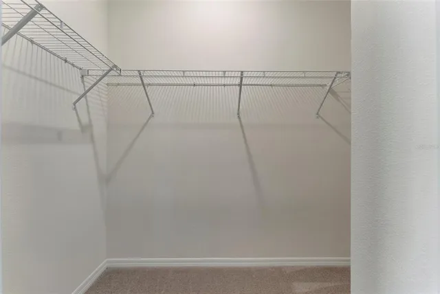 a view of small space with racks on the wall