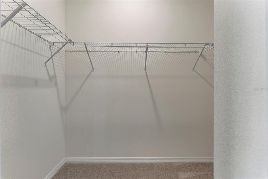 5210 Grove Mill Loop Lakewood Ranch, FL 34211 - Photo 26 of 48 a view of small space with racks on the wall