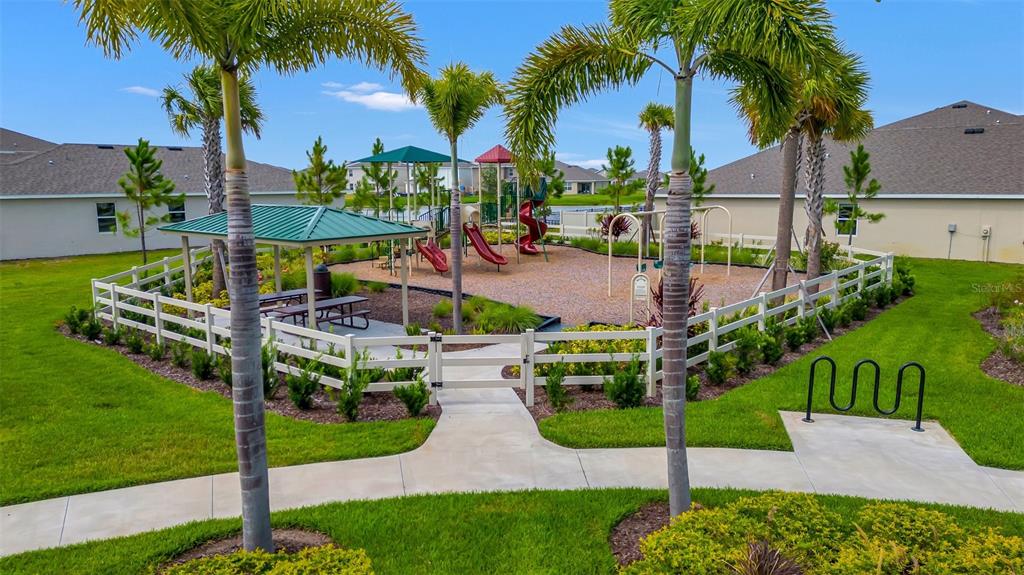 5210 Grove Mill Loop Lakewood Ranch, FL 34211 - Photo 33 of 48 a view of a park with palm trees