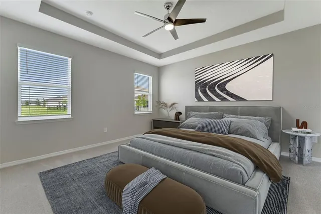 a bedroom with bed and a window