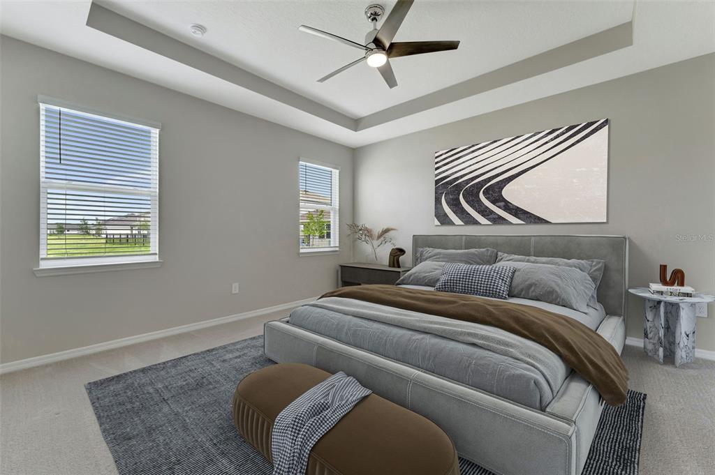 5210 Grove Mill Loop Lakewood Ranch, FL 34211 - Photo 37 of 48 a bedroom with bed and a window