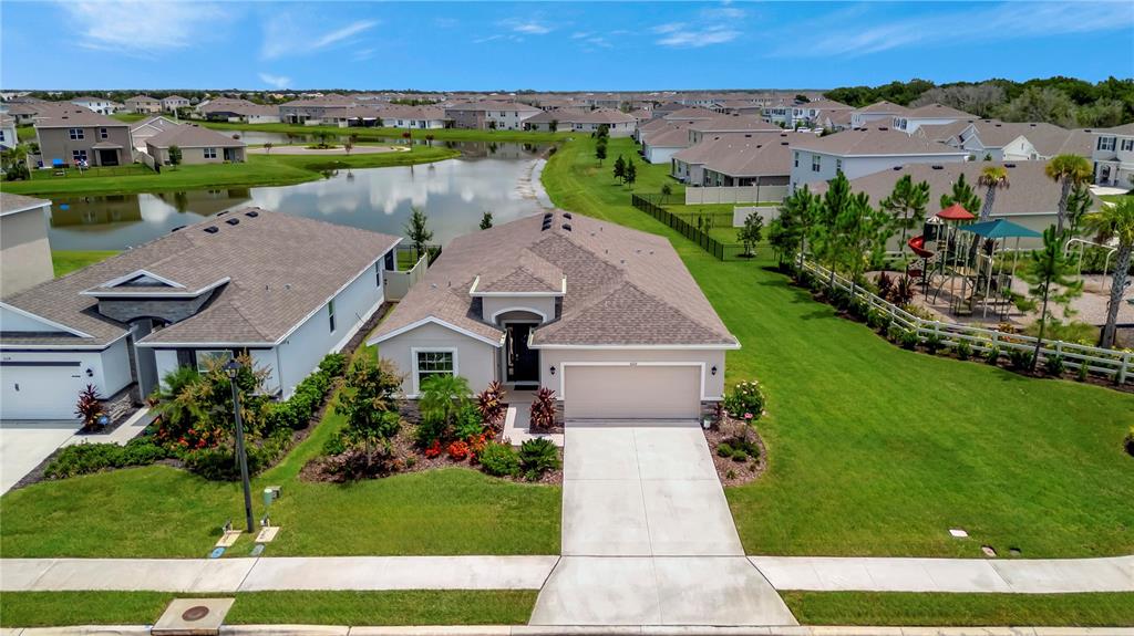 5210 Grove Mill Loop Lakewood Ranch, FL 34211 - Photo 45 of 48 an aerial view of a house