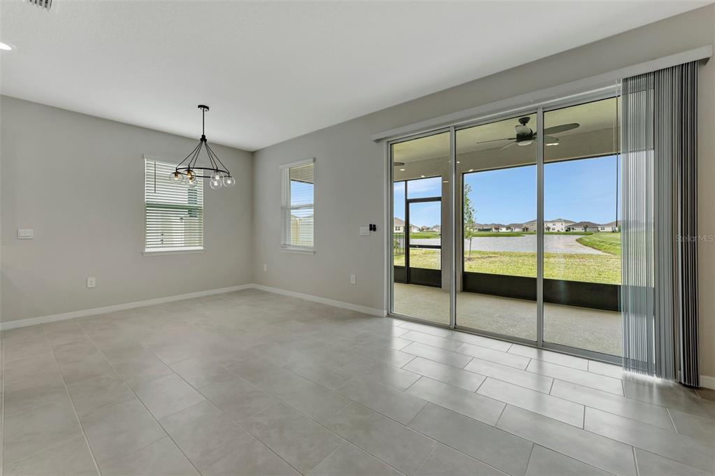 5210 Grove Mill Loop Lakewood Ranch, FL 34211 - Photo 8 of 48 a view of an empty room with a window