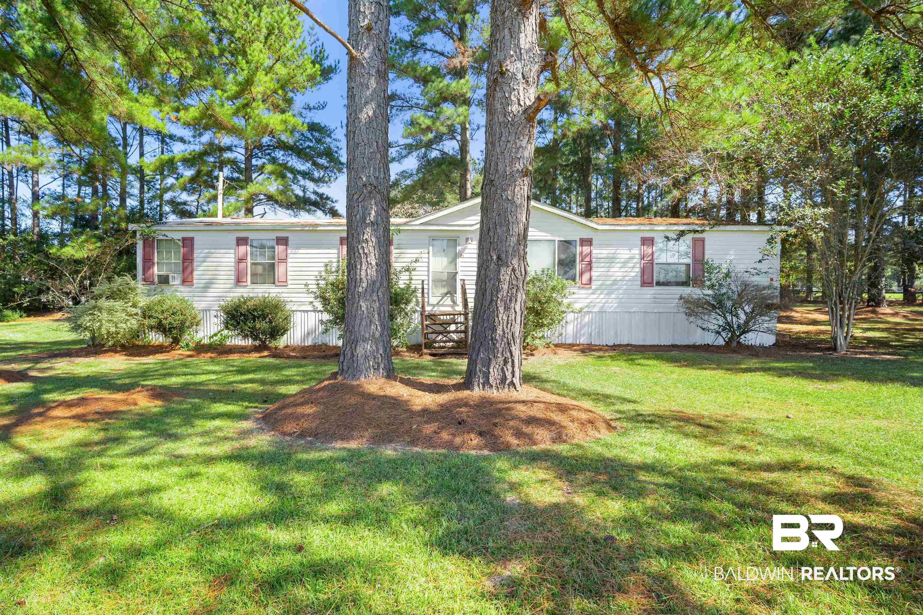23700 Cumberland Road Robertsdale, AL 36567 - Photo 1 of 33 Manufactured / mobile home featuring a front yard