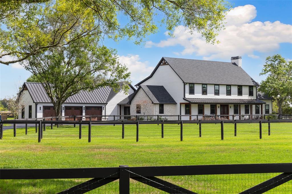 11602 Innfields Drive Odessa, FL 33556 - Photo 1 of 1 a front view of a house with a yard