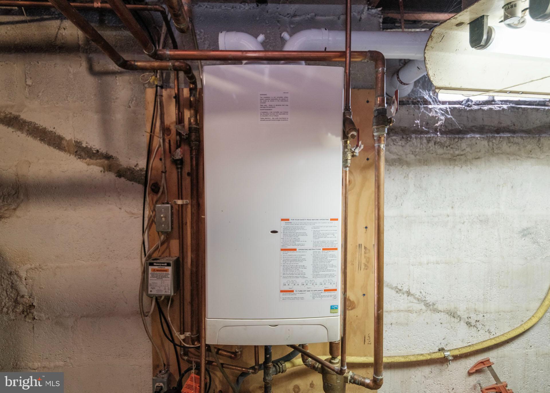 40 Walnut Street Reading, PA 19606 - Photo 26 of 27 Tankless hot water heater