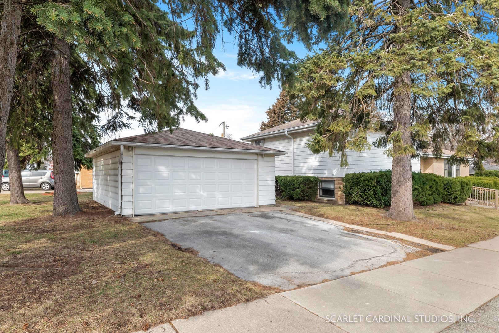 5018 Butterfield Road Hillside, IL 60162 - Photo 2 of 17 front view of a house with a trees
