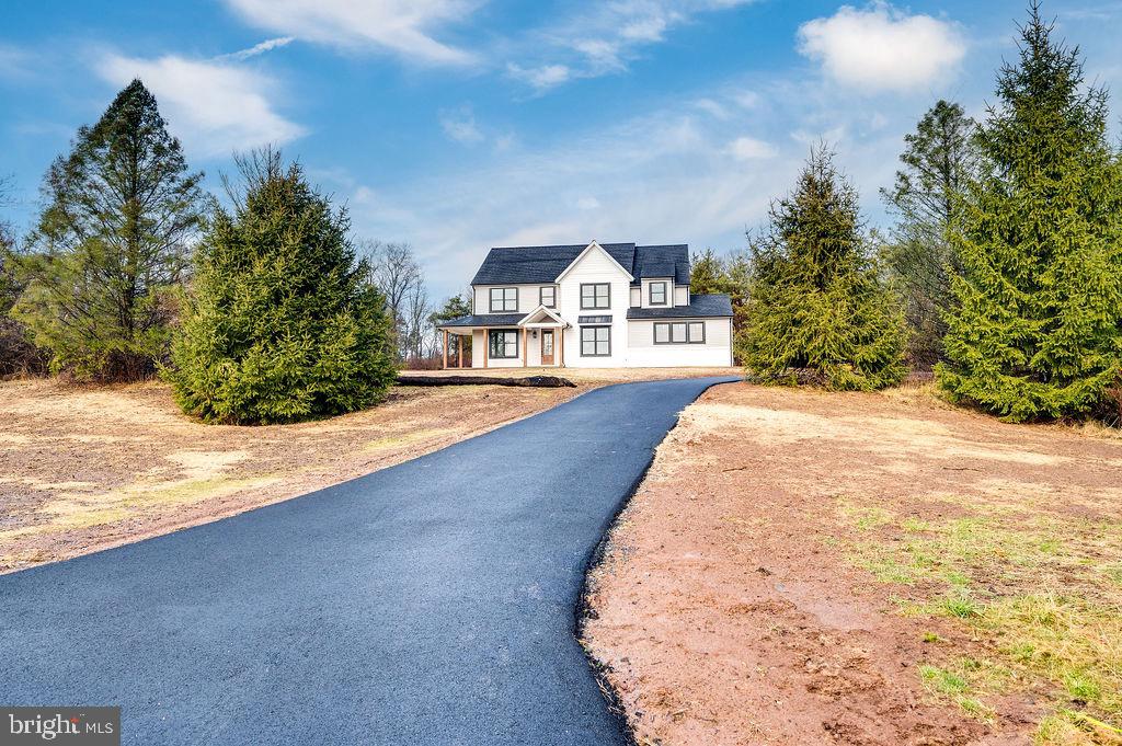 1053 Nemeth Road Coopersburg, PA 18036 - Photo 2 of 31 Long driveway leading to home behind trees