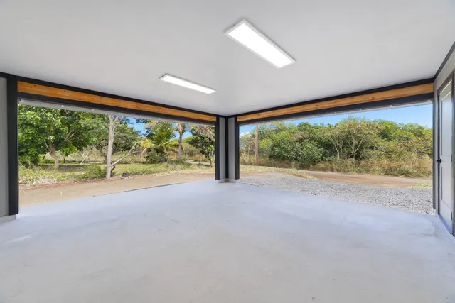 a view of storage and utility room with washer and dryer