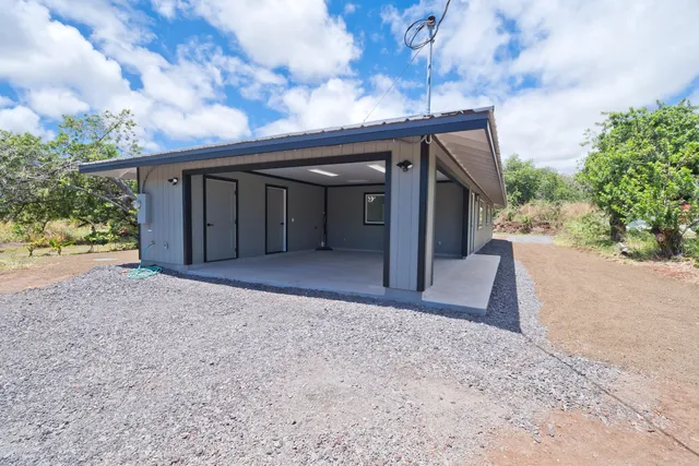 a view of a room with a large window