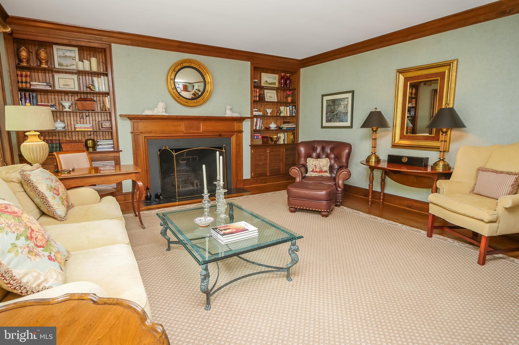 234 Pine Valley Road Dover, DE 19904 - Photo 12 of 48 a living room with furniture a clock and a fireplace