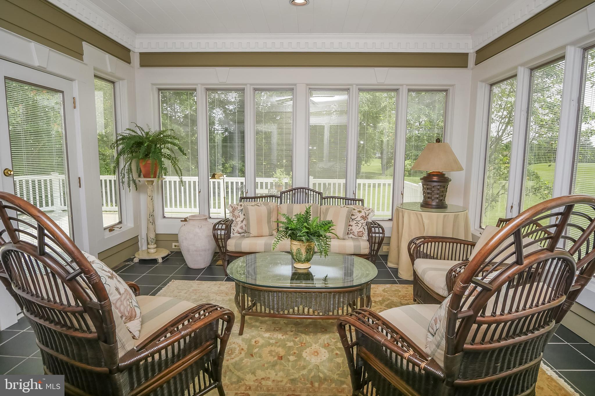 234 Pine Valley Road Dover, DE 19904 - Photo 13 of 48 a living room with furniture a table and a potted plant