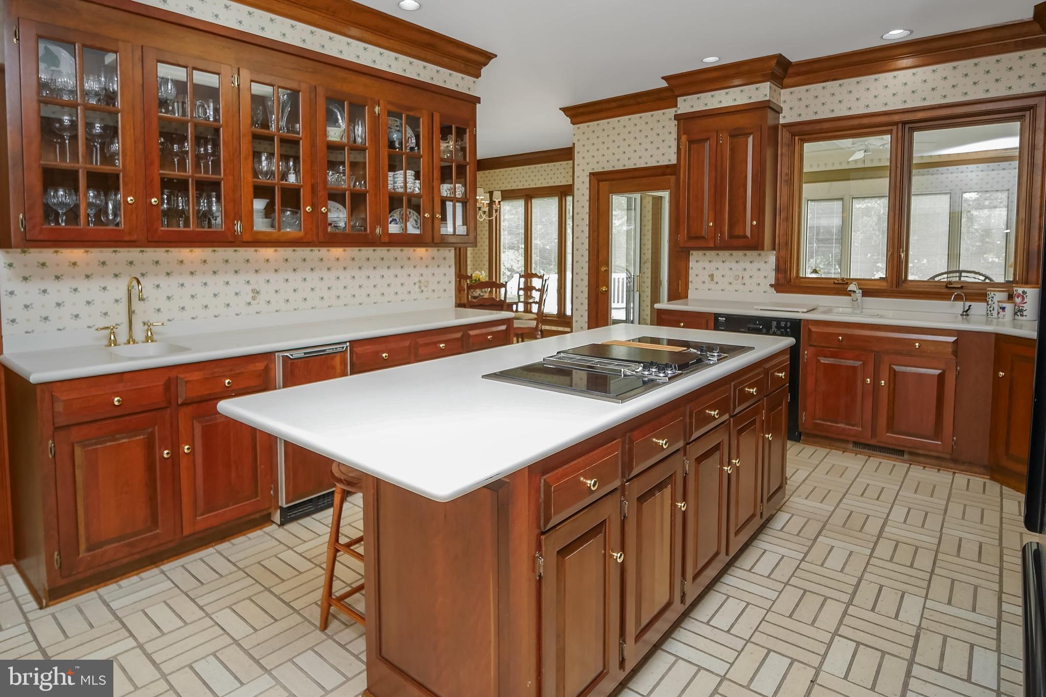 234 Pine Valley Road Dover, DE 19904 - Photo 18 of 48 a kitchen with stainless steel appliances granite countertop a sink and a stove