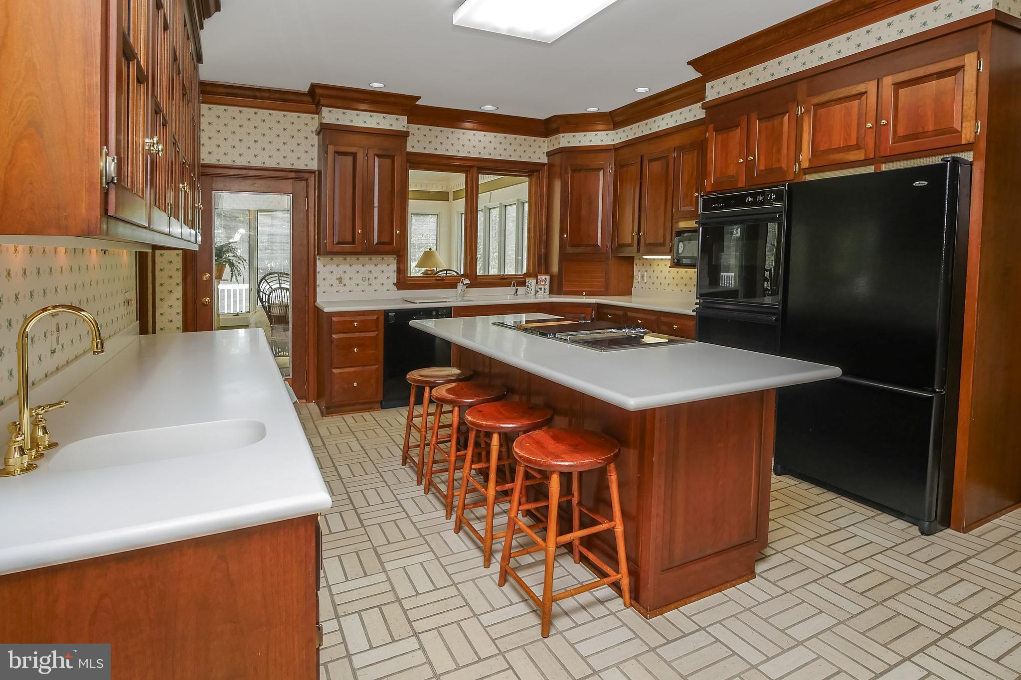 234 Pine Valley Road Dover, DE 19904 - Photo 19 of 48 a kitchen with stainless steel appliances granite countertop a sink and a refrigerator