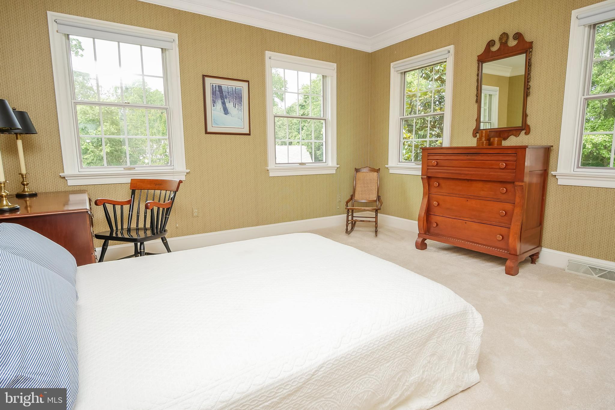 234 Pine Valley Road Dover, DE 19904 - Photo 33 of 48 a bedroom with a bed and chair