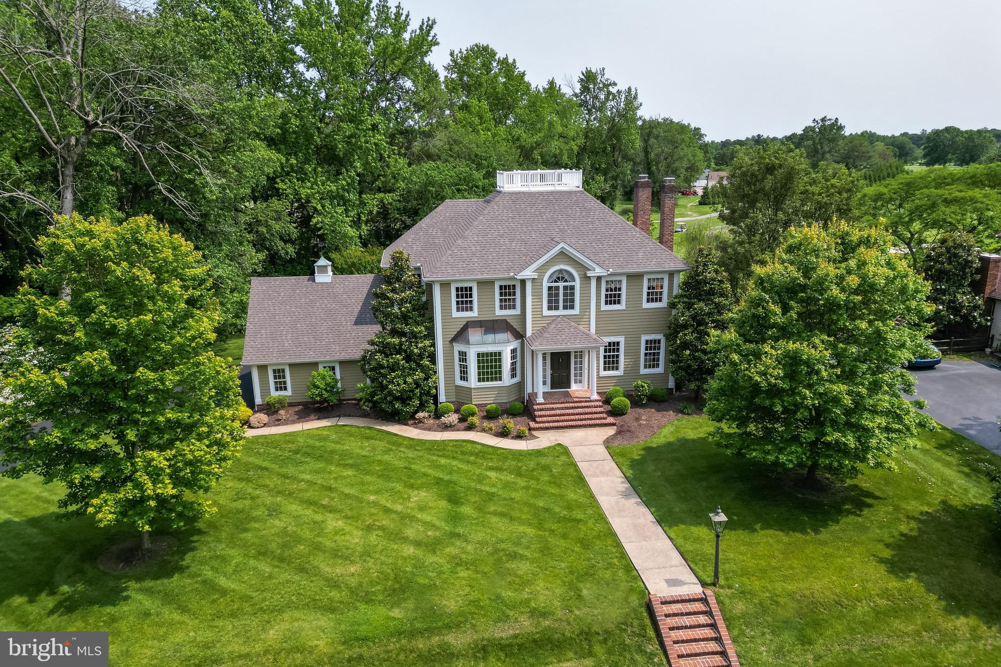 234 Pine Valley Road Dover, DE 19904 - Photo 5 of 48 a front view of a house with a yard table and chairs