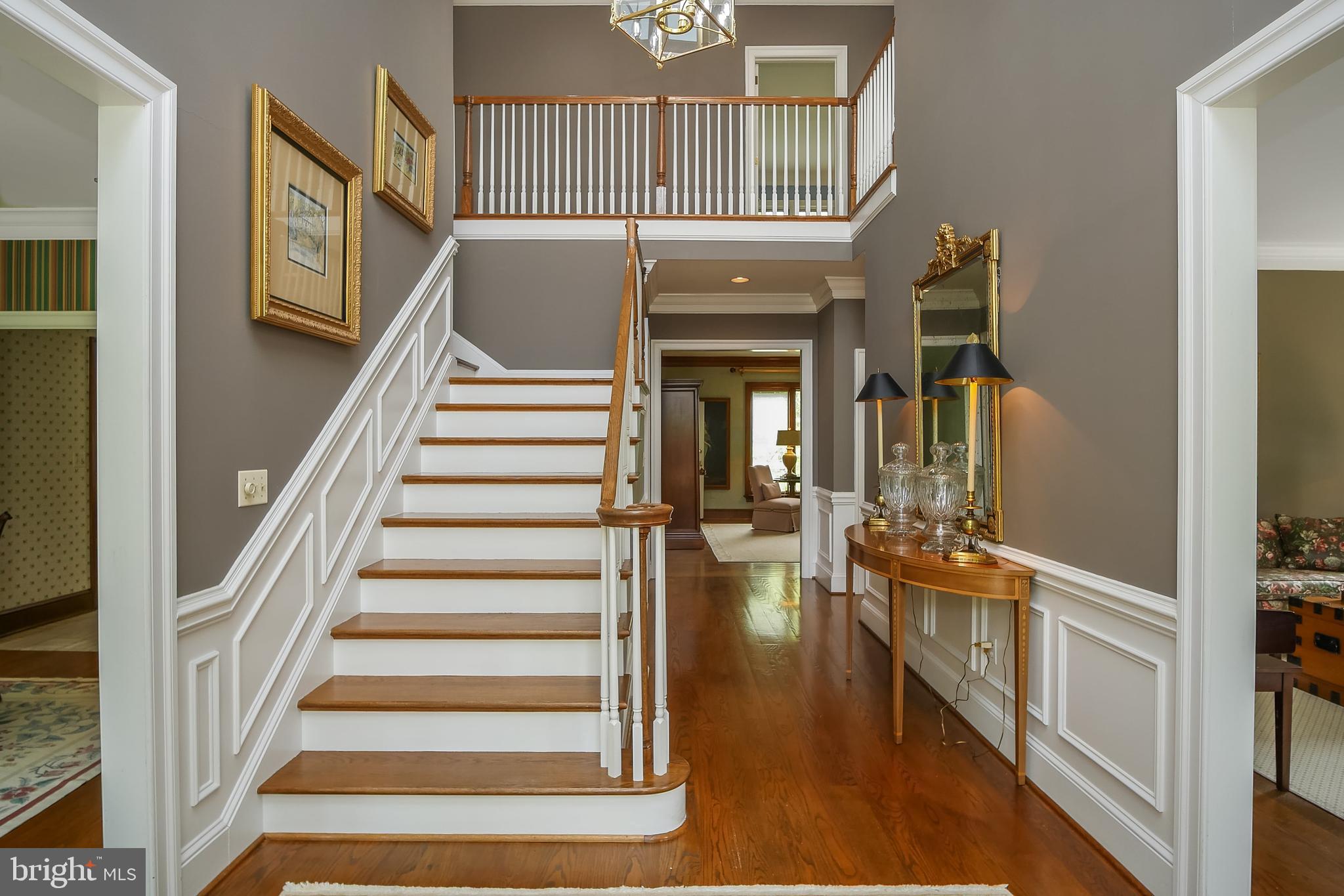 234 Pine Valley Road Dover, DE 19904 - Photo 6 of 48 a view of entryway and hall with wooden floor