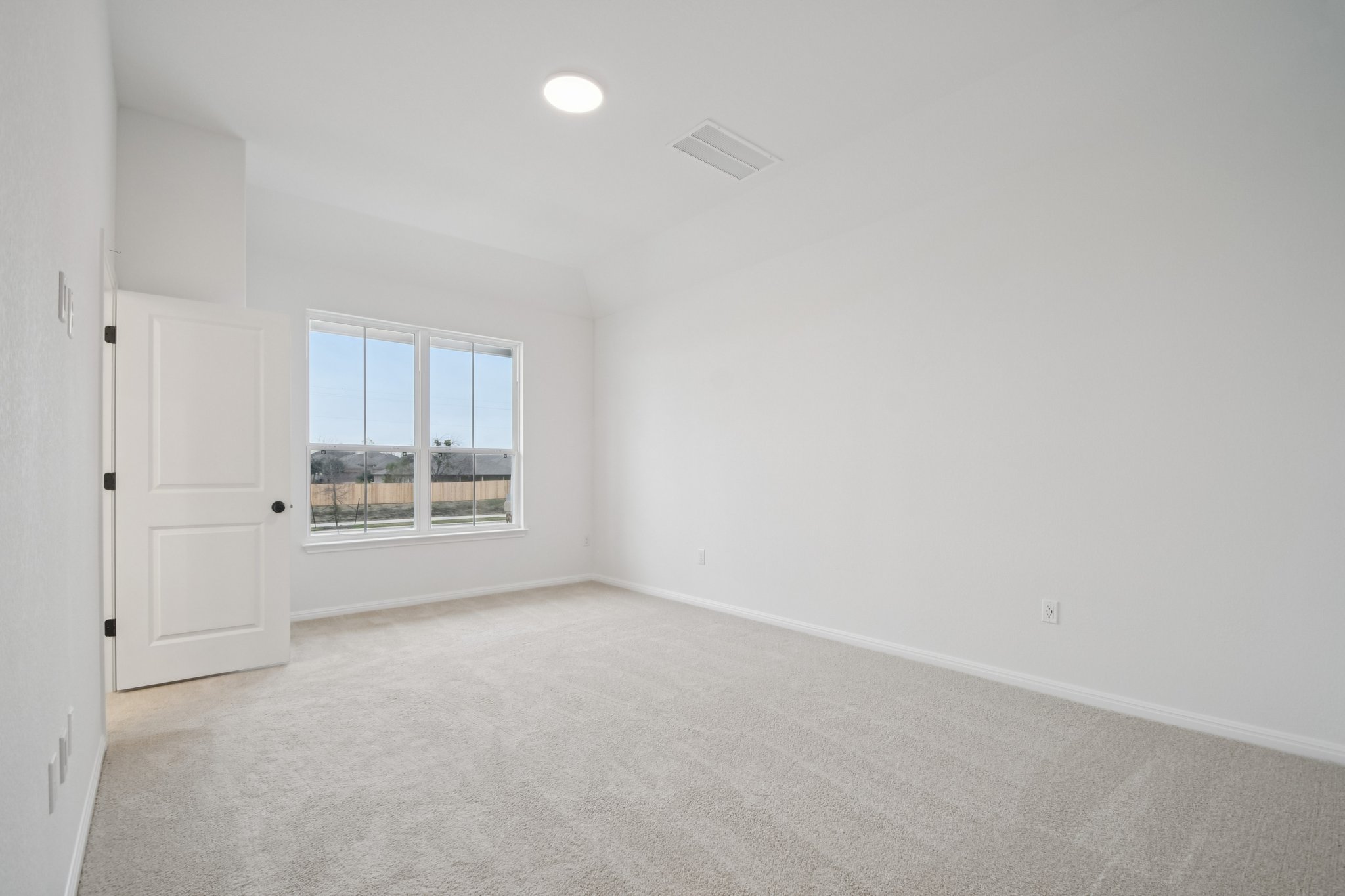 6385 Marsh Lane Buda, TX 78610 - Photo 11 of 35 a view of an empty room and window