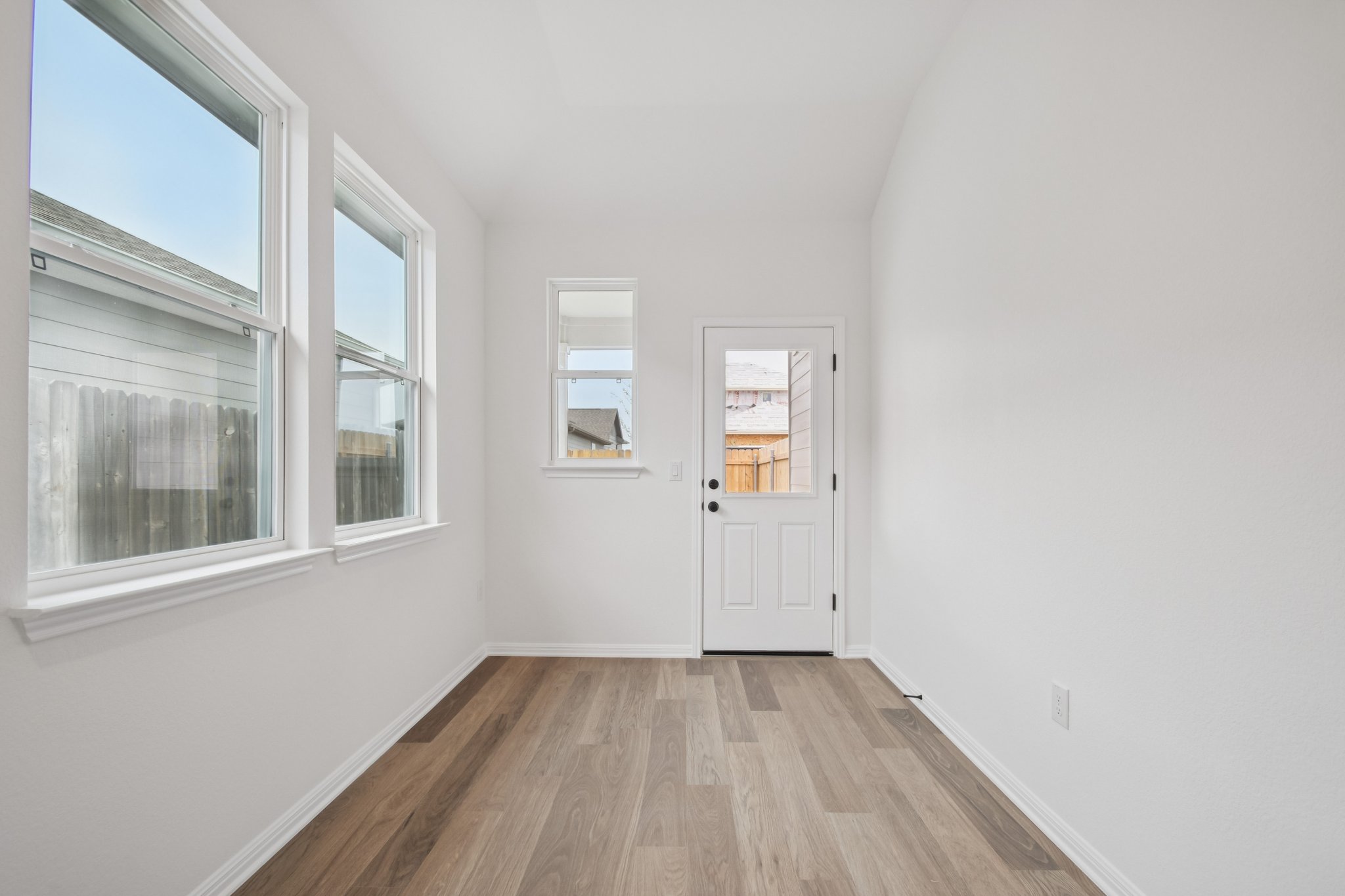 6385 Marsh Lane Buda, TX 78610 - Photo 22 of 35 an empty room with windows