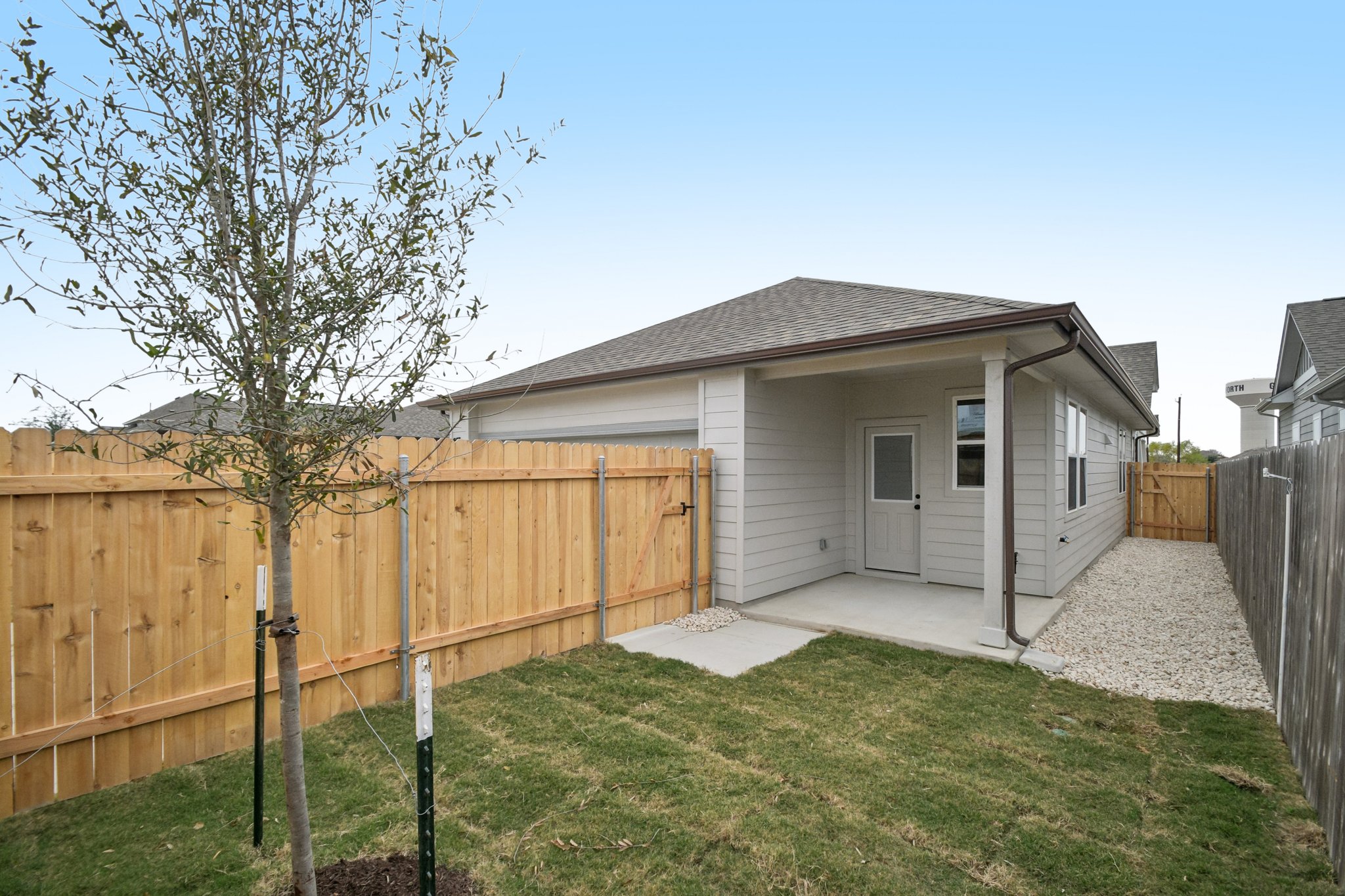 6385 Marsh Lane Buda, TX 78610 - Photo 28 of 35 a house view with a backyard space