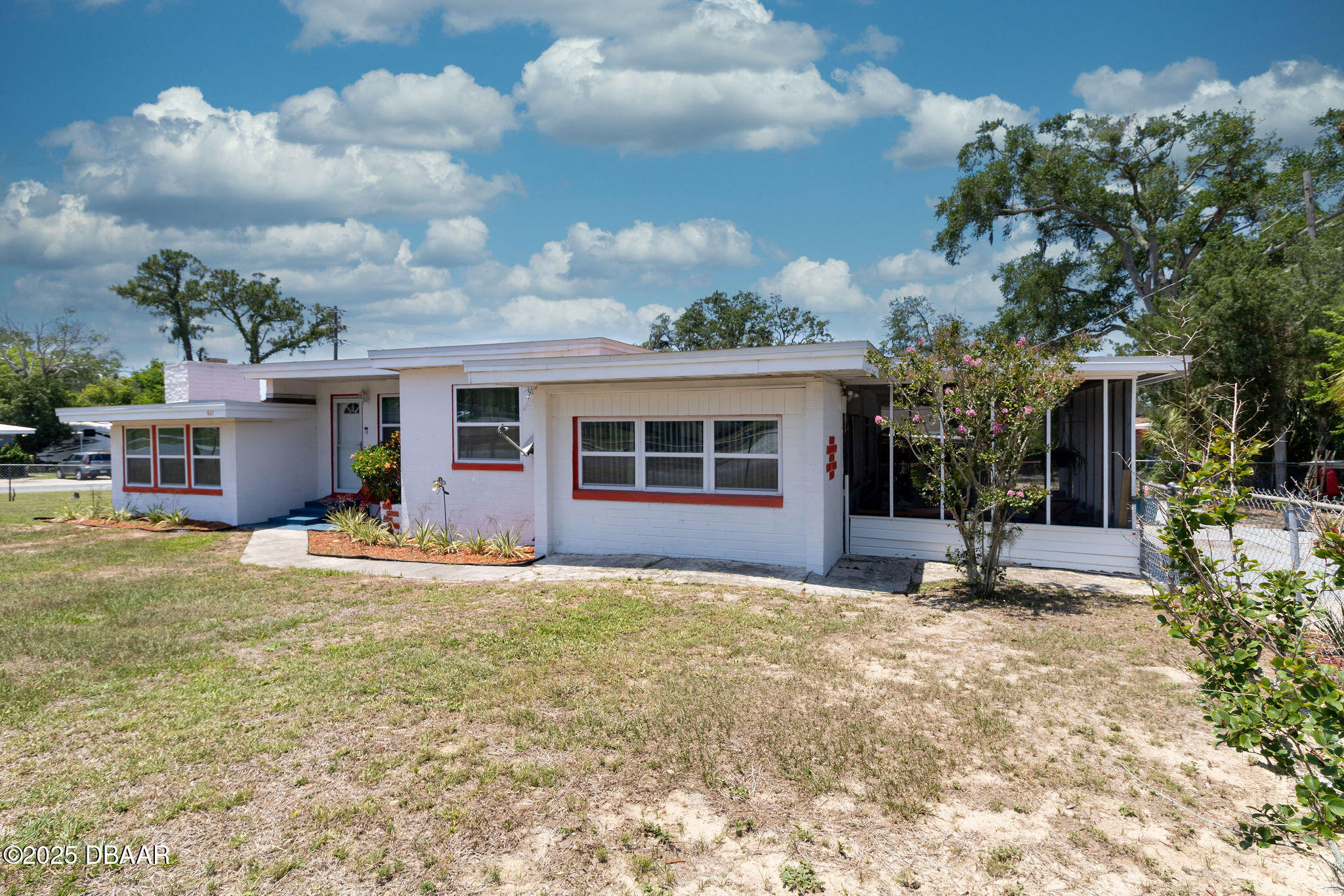 front view of a house with a patio