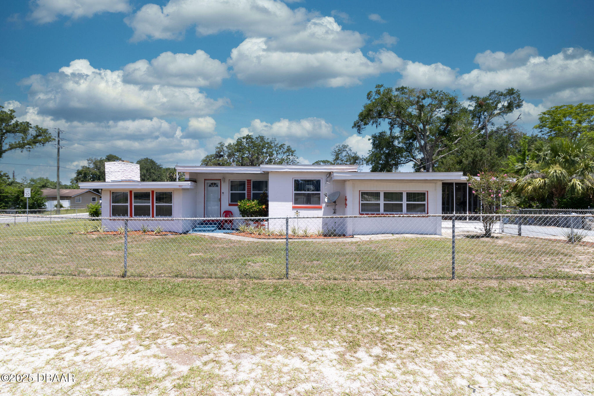 601 Berkshire Road Daytona Beach, FL 32114 - Photo 20 of 21 a view of a house with a swimming pool
