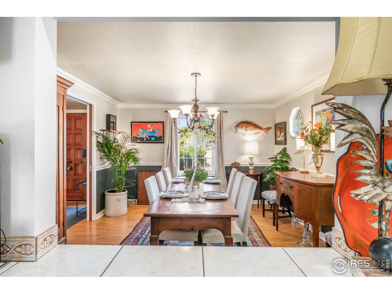 9322 Rogers Road Longmont, CO 80503 - Photo 11 of 40 Pass-through opening from kitchen into formal dining room