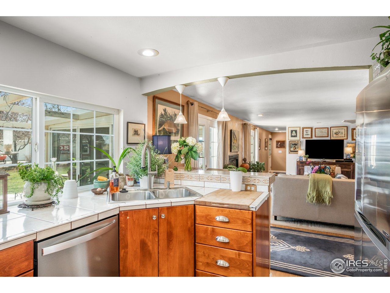 9322 Rogers Road Longmont, CO 80503 - Photo 12 of 40 Kitchen opens to Great Room