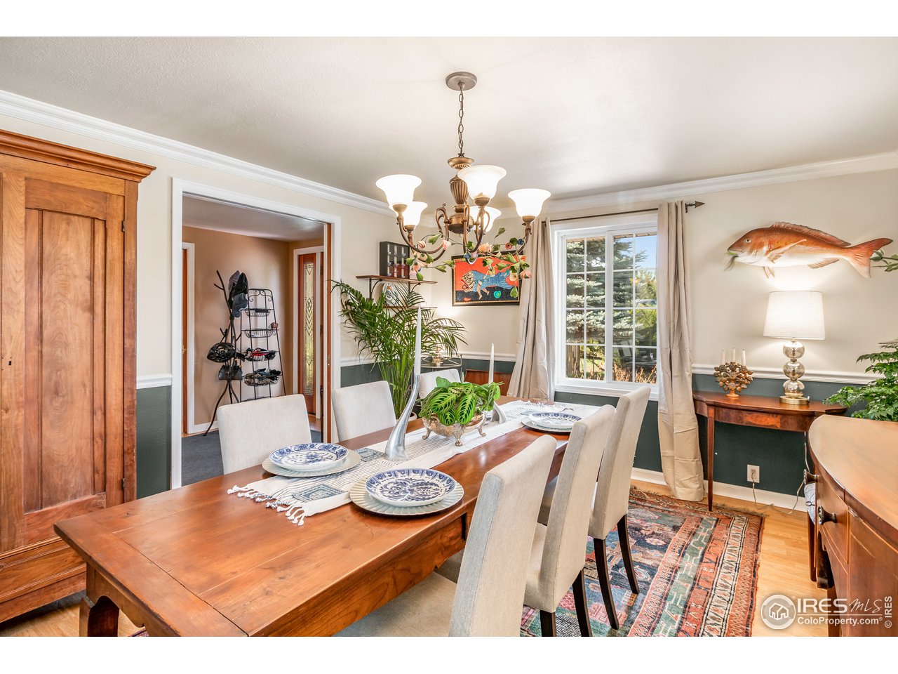 9322 Rogers Road Longmont, CO 80503 - Photo 5 of 40 Formal Dining Room has pocket doors