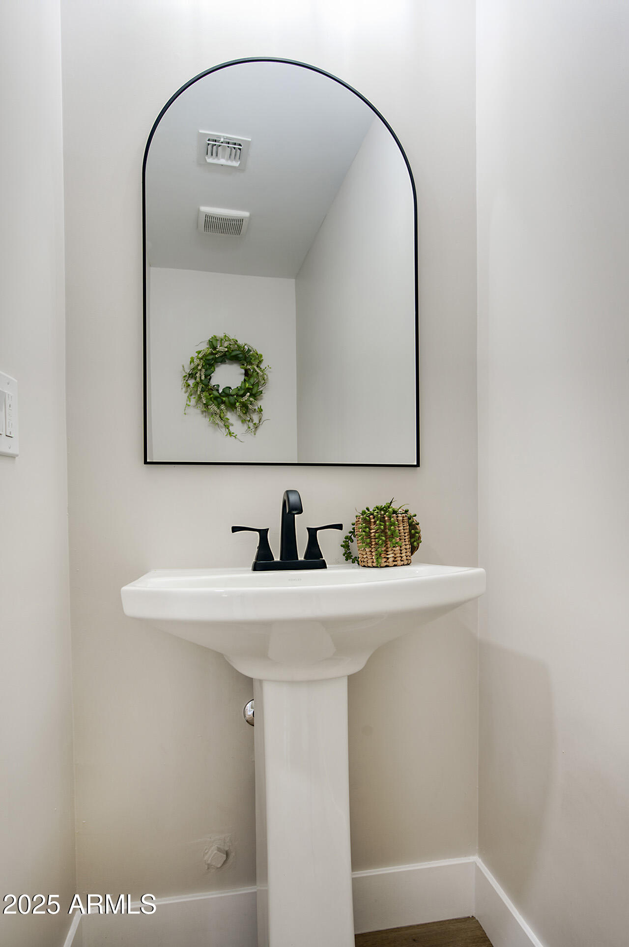 1561 North 26th Street Mesa, AZ 85213 - Photo 18 of 35 a bathroom with a sink and a mirror