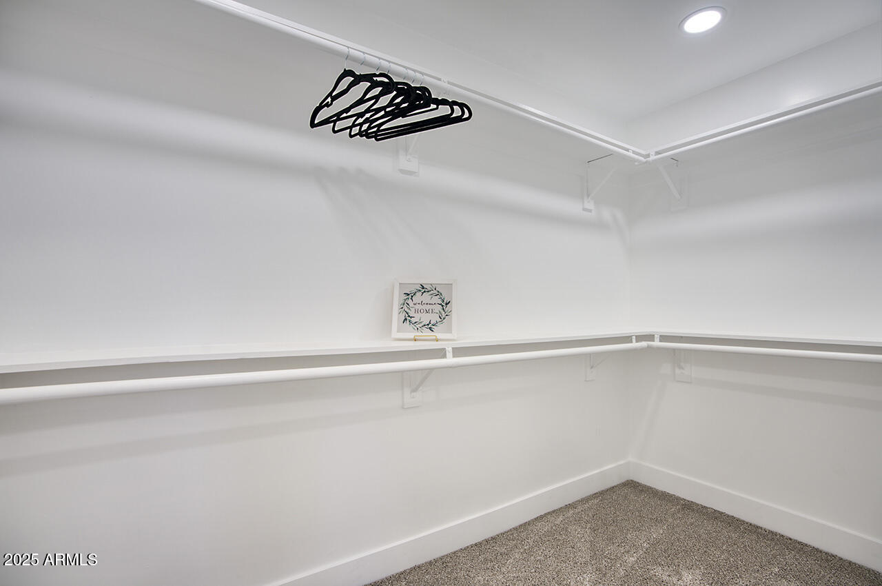 1561 North 26th Street Mesa, AZ 85213 - Photo 23 of 35 a view of a room with rack on the wall