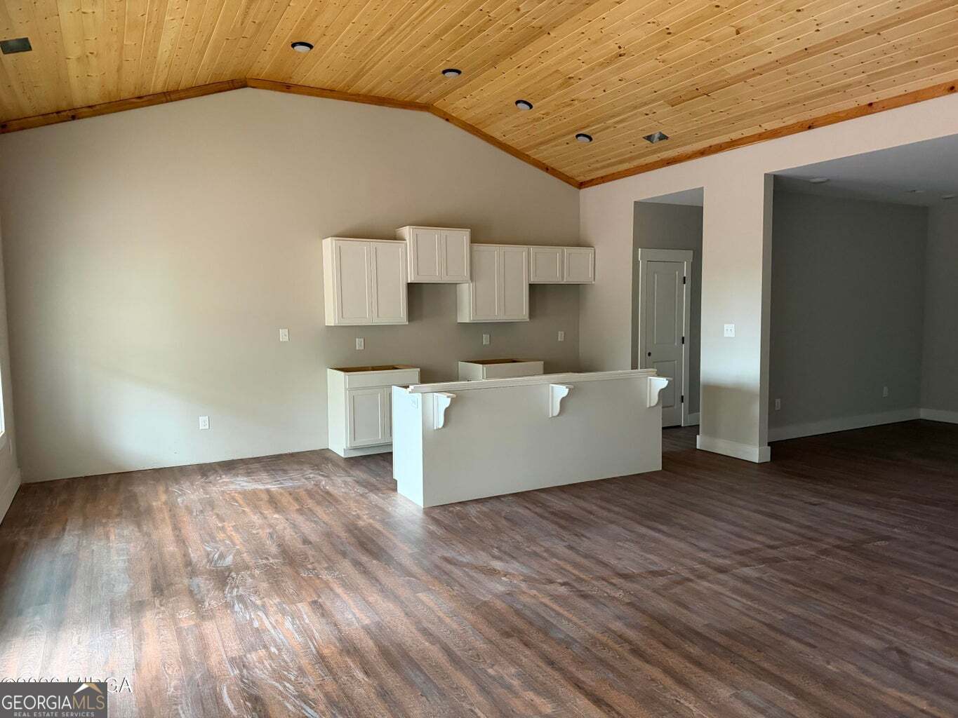146 Overland Way Gray, GA 31032 - Photo 5 of 8 a view of a kitchen with wooden floor and electronic appliances