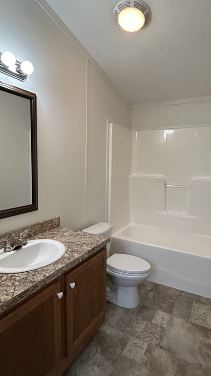 8 Alfred Street Wareham, MA 02538 - Photo 7 of 8 a bathroom with a granite countertop sink a toilet a mirror and bathtub