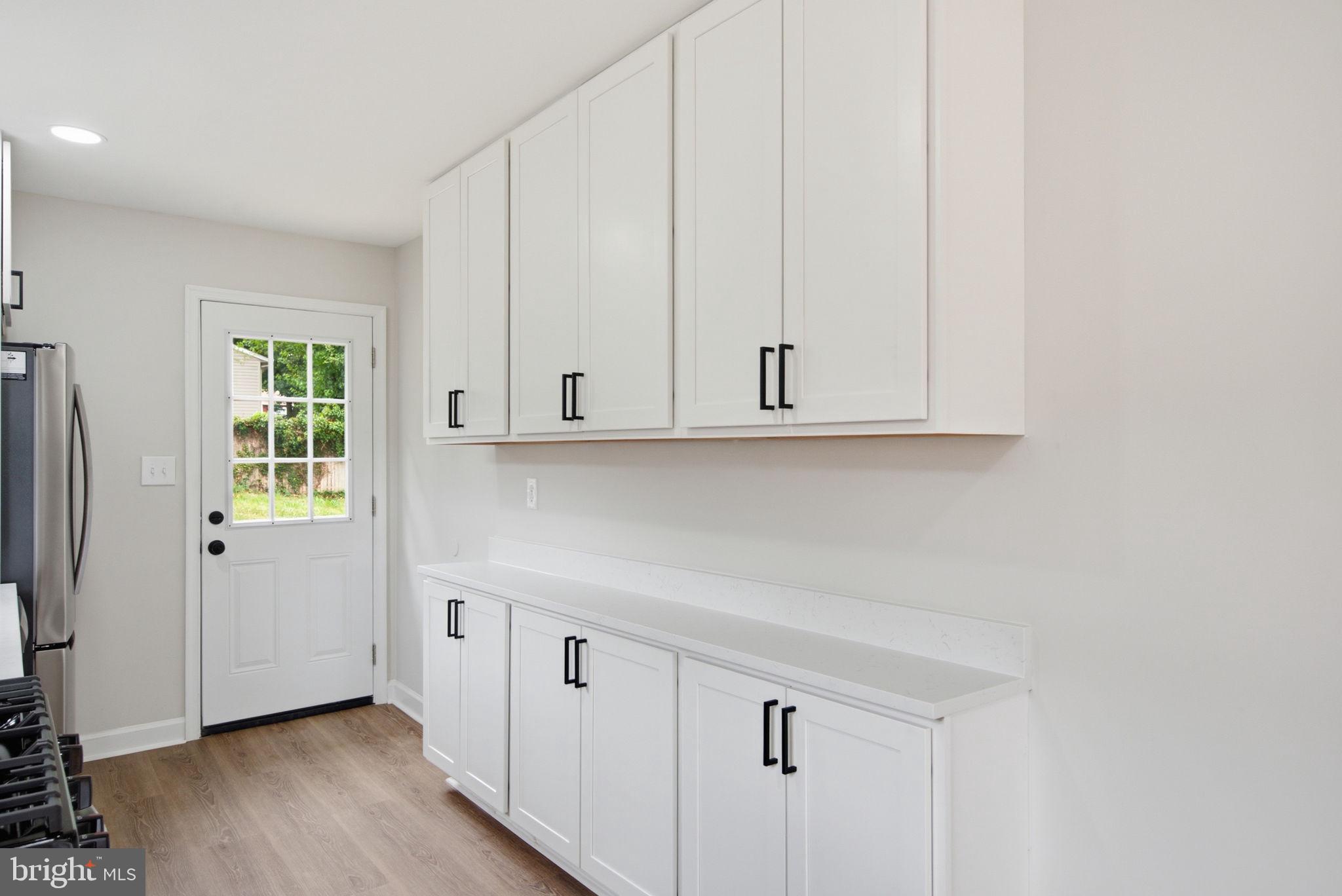 6615 Valley Park Road Capitol Heights, MD 20743 - Photo 7 of 25 Sleek kitchen with modern cabinetry.