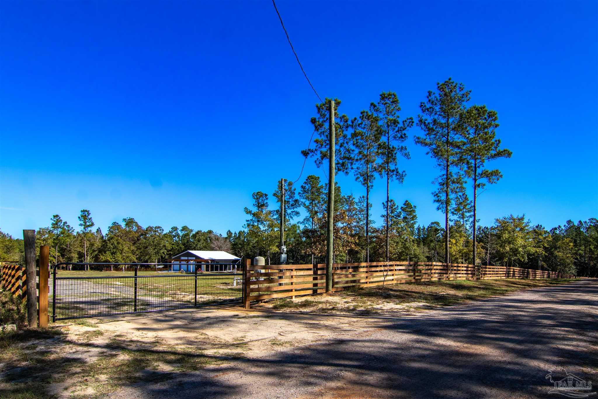 2232 Bison Drive Pace, FL 32571 - Photo 17 of 27 a view of a yard