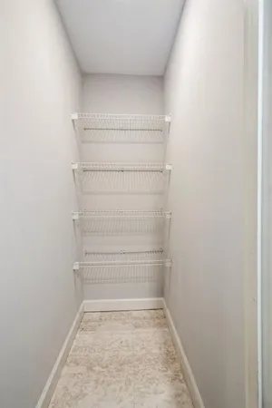 a kitchen with cabinets and stainless steel appliances