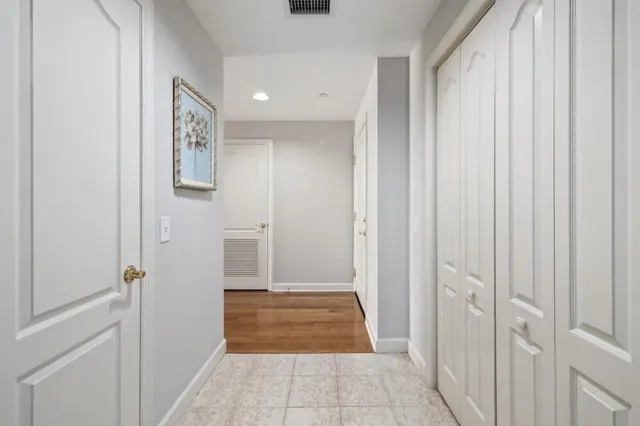 a view of cabinets and window