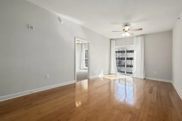 a view of kitchen and refrigerator