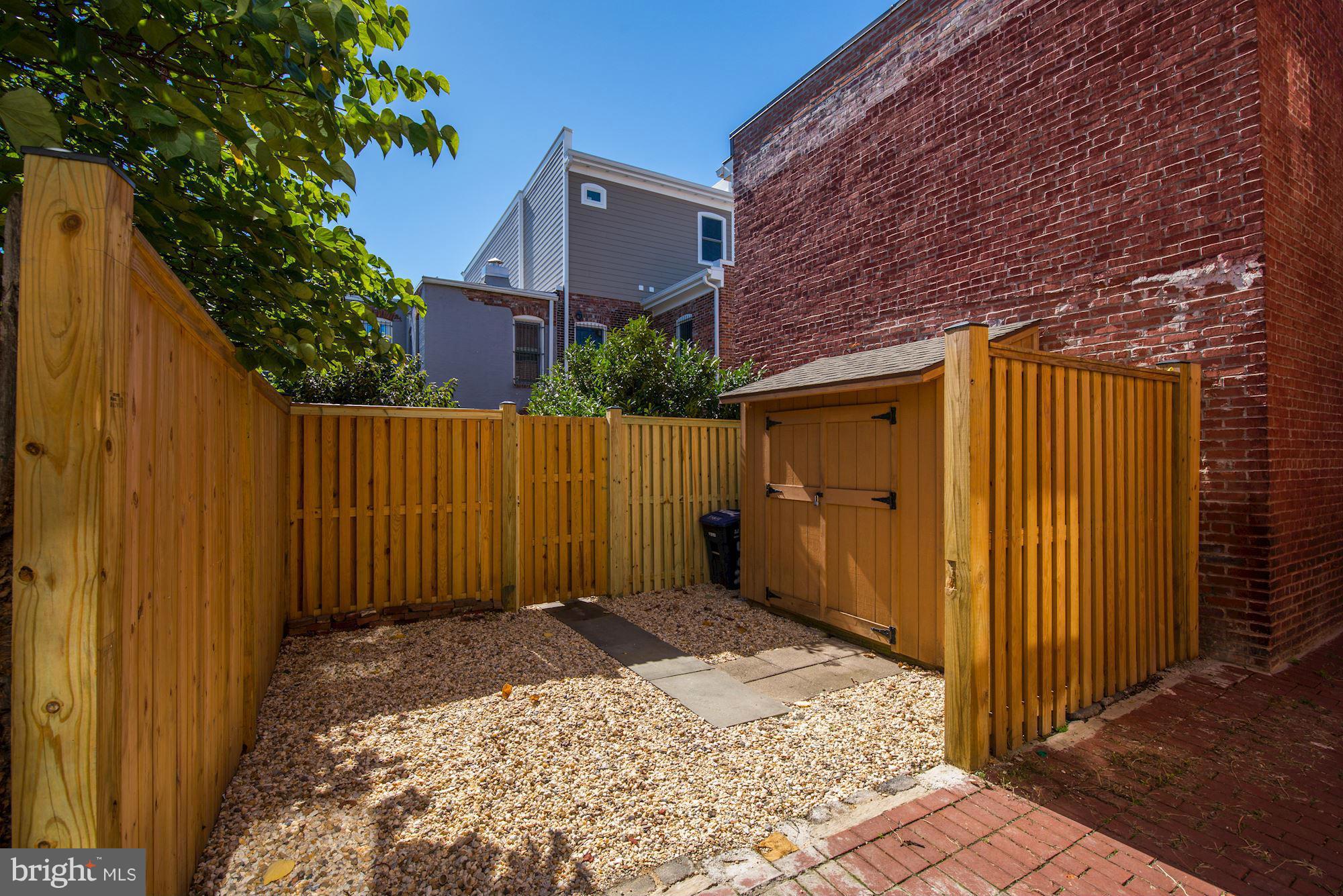 402 K Street Northeast Washington, DC 20002 - Photo 21 of 23 Parking off brick alley with storage