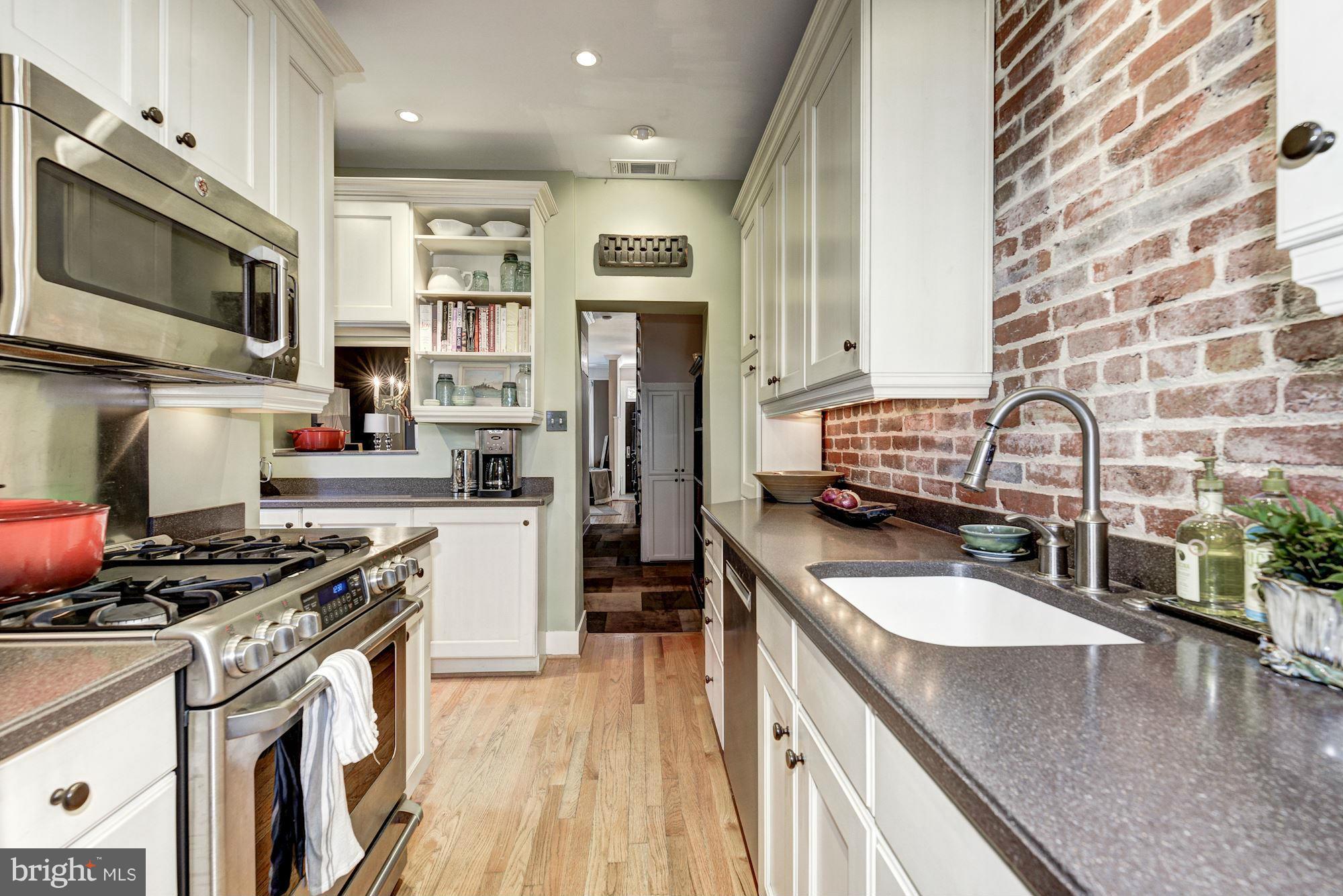 402 K Street Northeast Washington, DC 20002 - Photo 9 of 23 Smart L Shape, exposed brick, ample space!